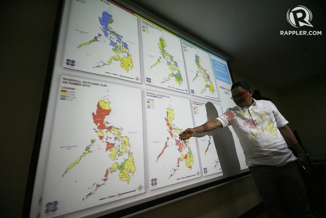 RAINY DAYS AHEAD. PAGASA acting administrator Vicente Malano shows on a map the monthly rainfall forecast for the year at the climate outlook forum at the PAGASA head office in Quezon City, as they declared the start of the rainy season on Tuesday, June 23. Photo by Ben Nabong/Rappler